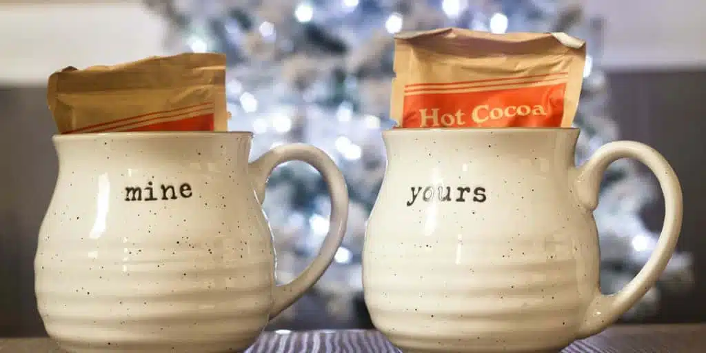 two shallow focus photo of white ceramic mugs